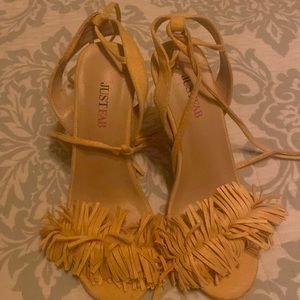 Beautiful yellow high heels perfect for sun dresses in the summer worm once